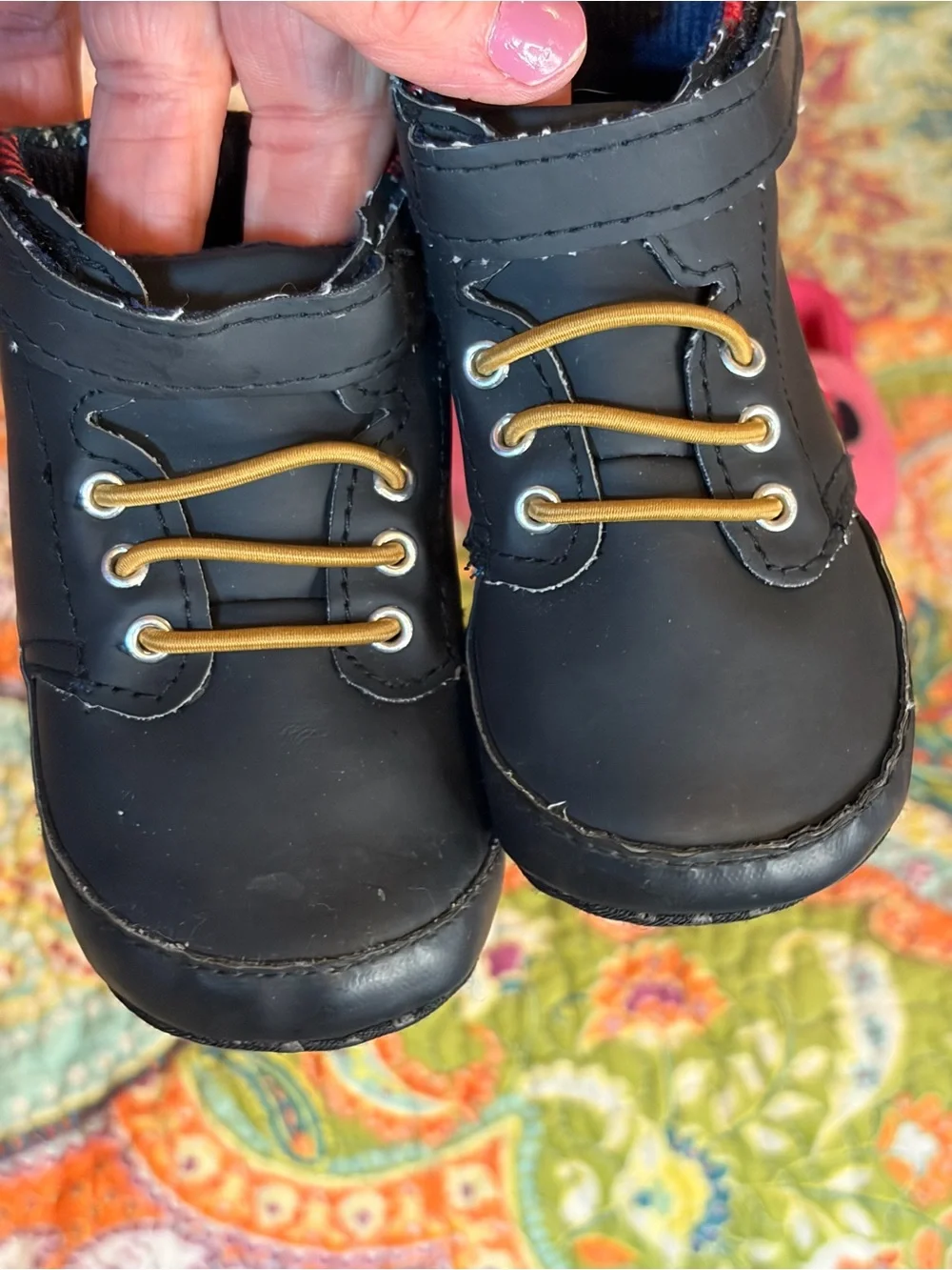 Lot of three pairs of Baby shoes.